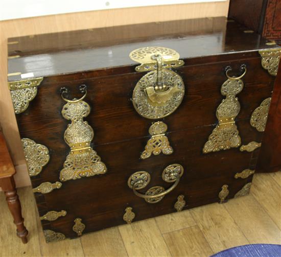 An Eastern brass mounted chest W.107cm